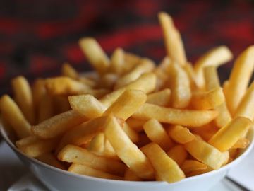 A bowl of chips on the counter